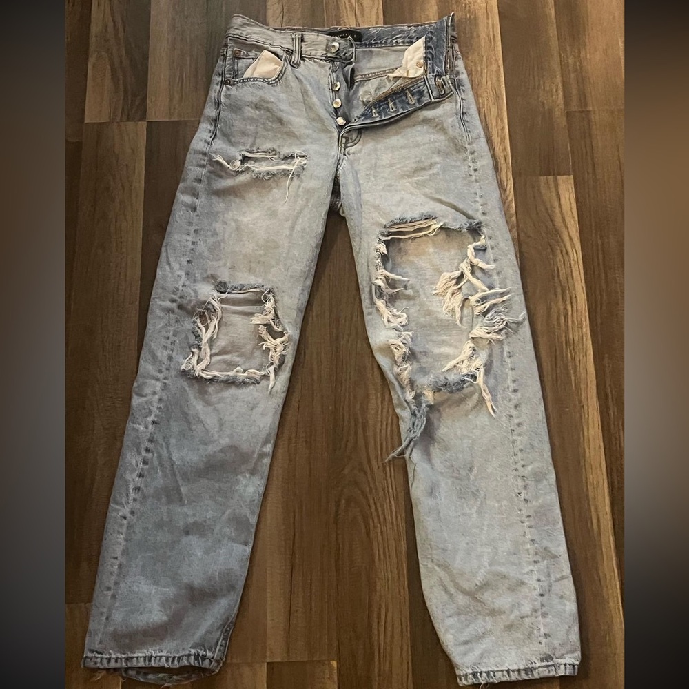 Perfect condition except one of the little belt loops are ripped, easy fix.